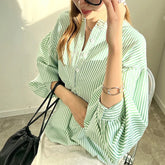 Blouse rayée à manches lanternes - Essentiel de bureau contemporain